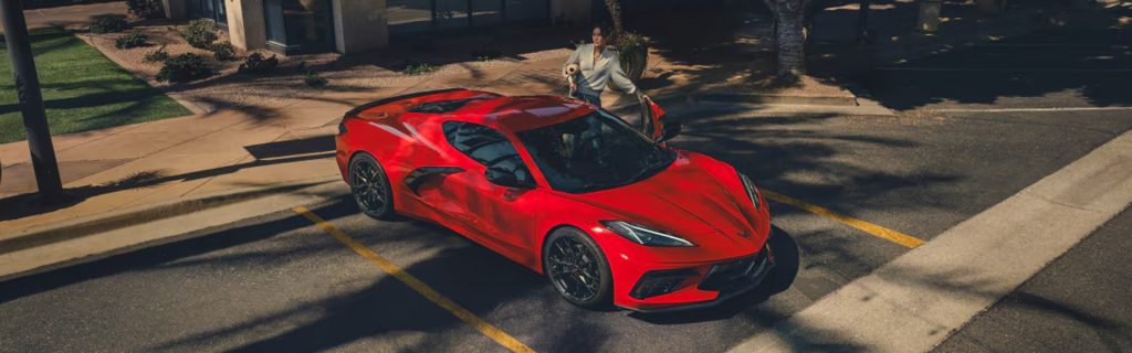 Red Chevrolet Corvette parked on street