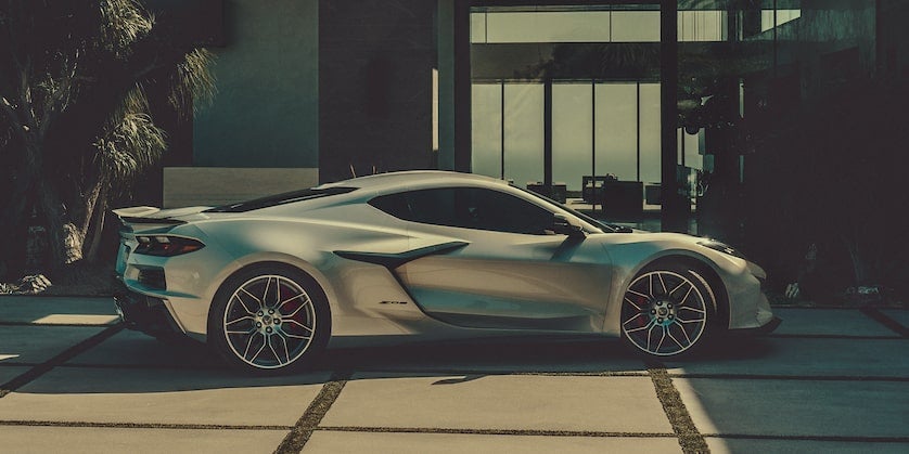 Green Corvette Z06 parked in garage