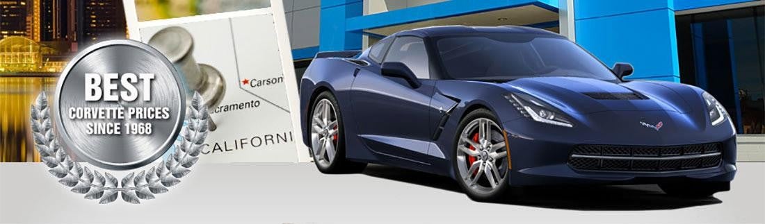 Blue Corvette parked in front of dealership with 'Best Corvette Prices Since 1968' badge.