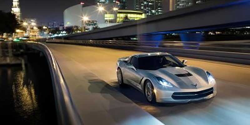 A silver Corvette Z51 driving down the highway